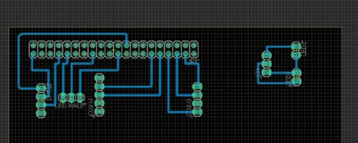 Board layout with blue traces between labelled pin headers.